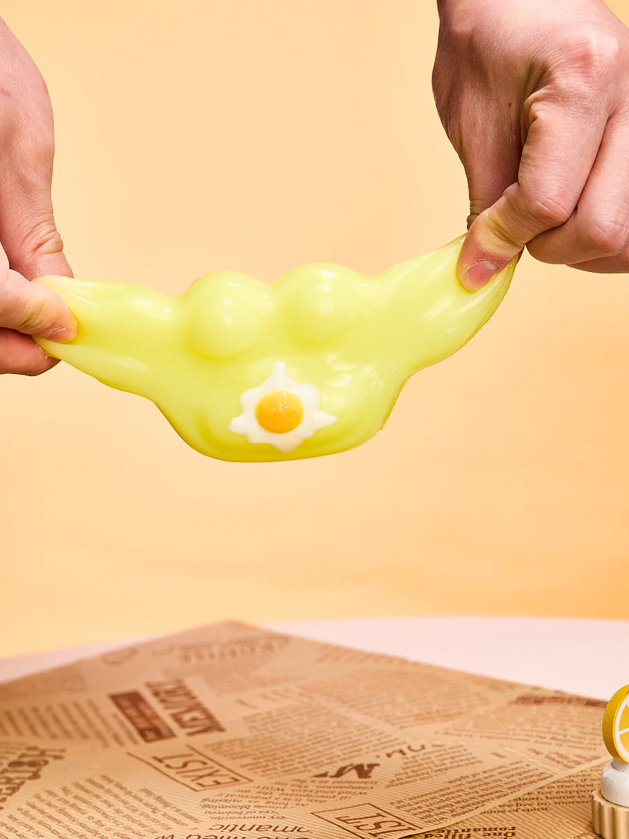 Yellow Egg Paw Taba Squishy