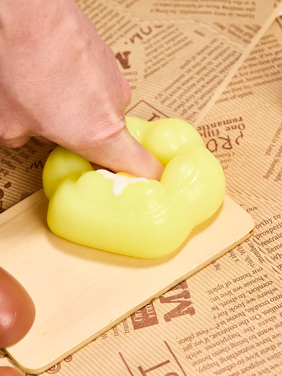 Yellow Egg Paw Taba Squishy