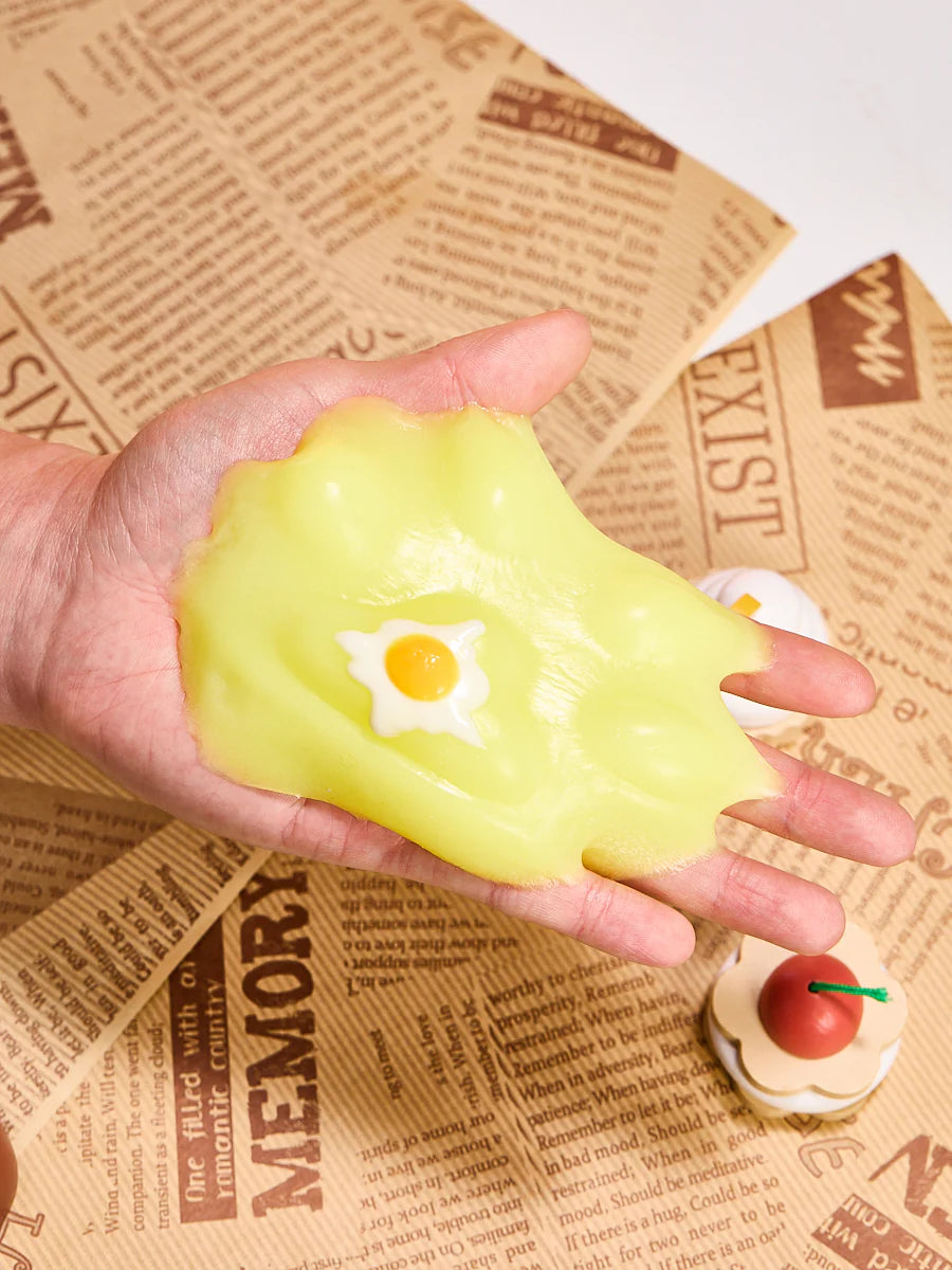 Yellow Egg Paw Taba Squishy