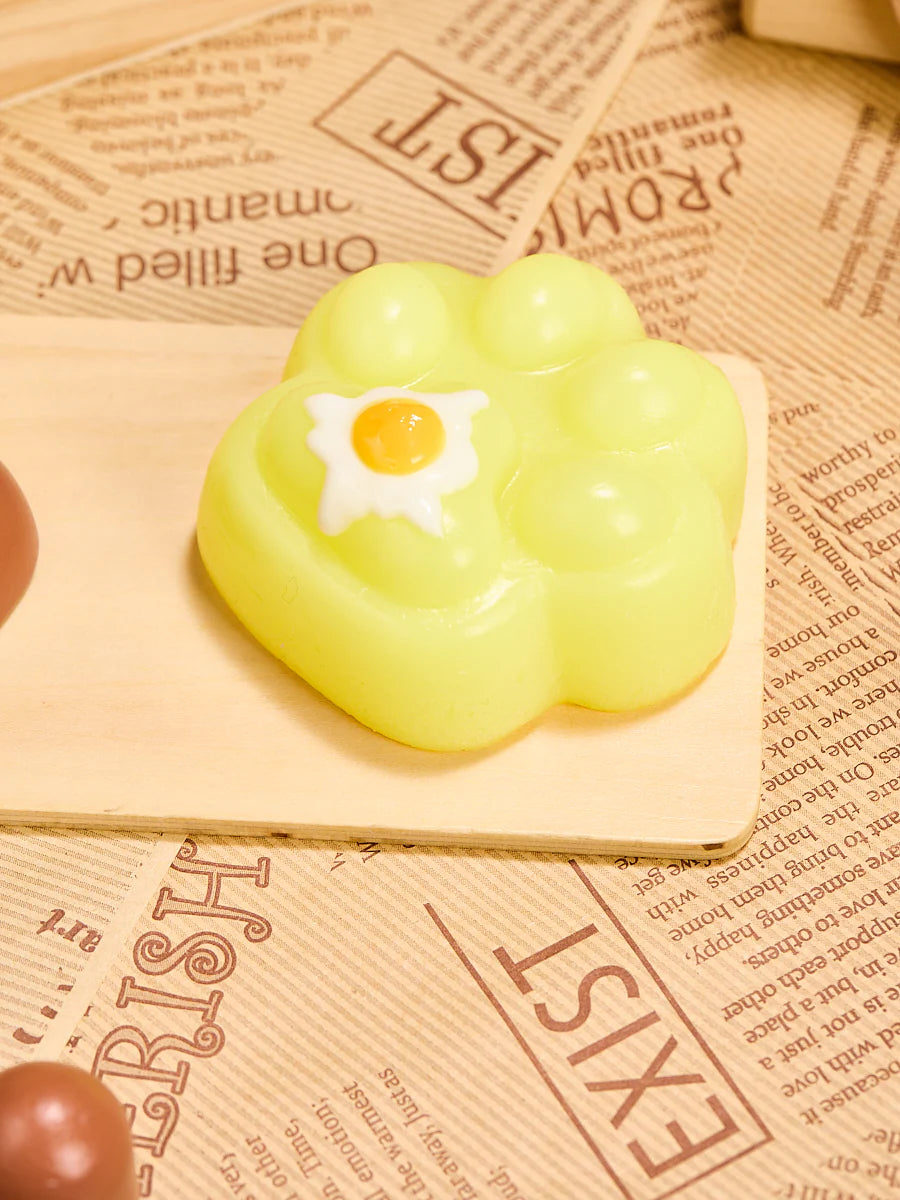 Yellow Egg Paw Taba Squishy